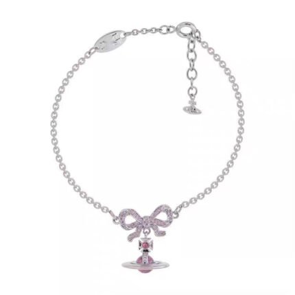 10F7F1B3-8751-4668-B0D8-D397FBCDEB70.jpg Pink/gold/purple OCTAVIE Bow Diamond Bracelet (with box)