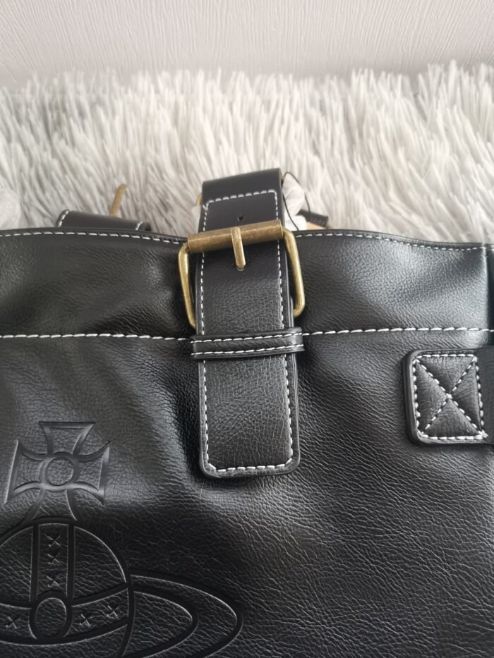 2356D7E2-4E90-4FEB-AADB-A887B899F8D0.jpg leather messenger bag (with dust bag)