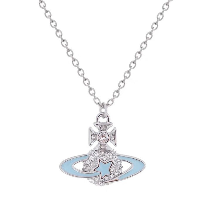 9A3FAA7C-8DF7-413C-97B7-37F5FA48637F.jpg blue and silver galaxy necklace (with box)