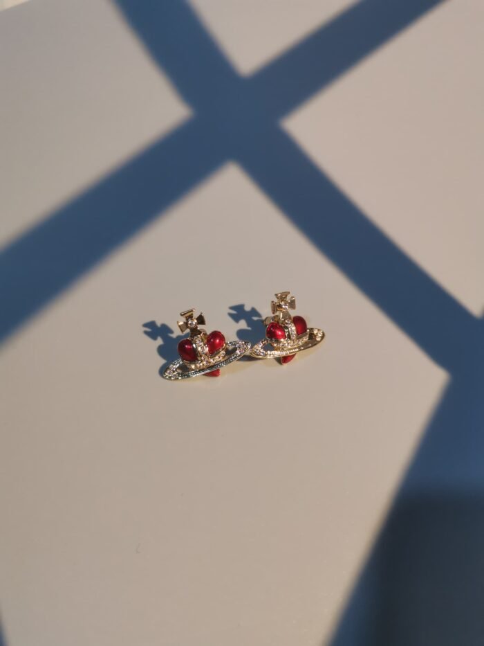 DA1F8C26-6837-4D7B-B1AF-053E86562C16.jpg gold and red heart earrings (with box)
