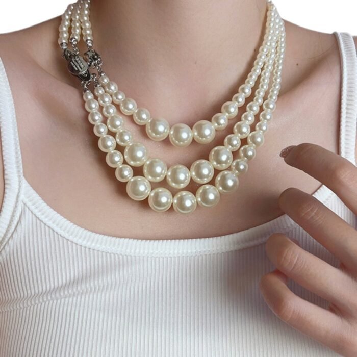 F0CBFC83-5B37-4407-AC85-33C59390B8CD.jpg layered pearl necklace (with box)