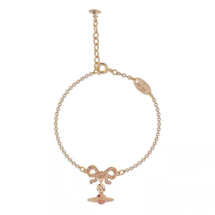 Pink/gold/purple OCTAVIE Bow Diamond Bracelet (with box)